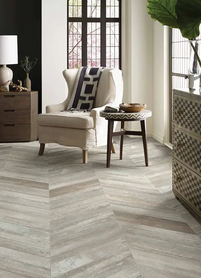 woof look tile flooring in a stylish living room with large windows