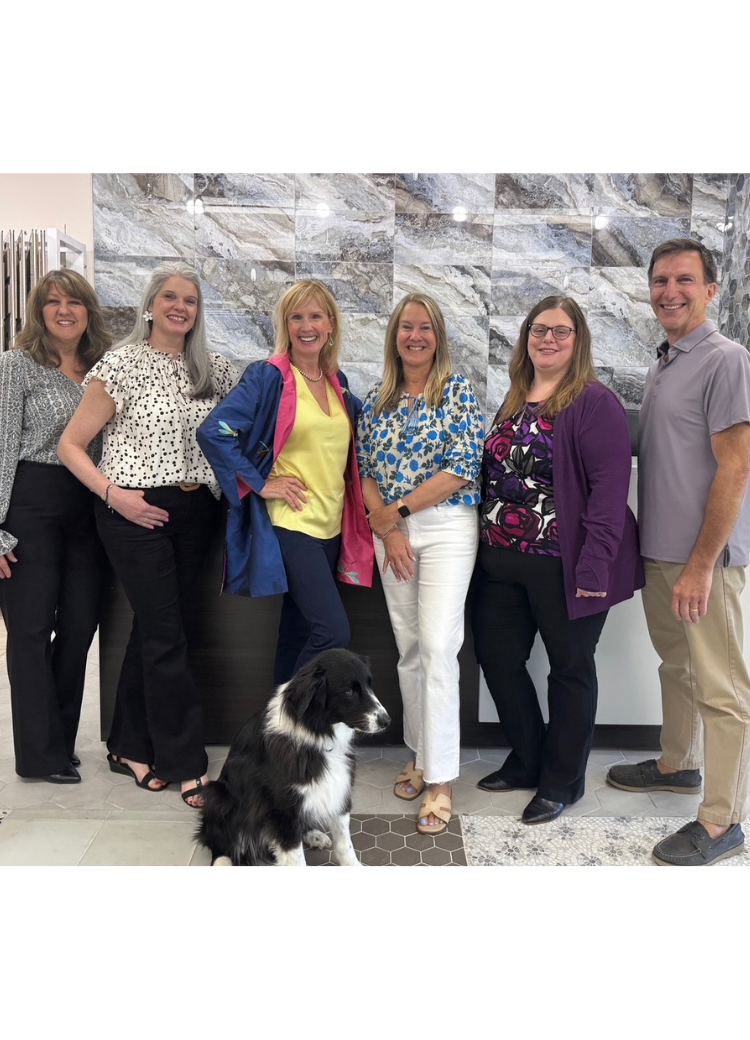 The flooring expert staff at Peck's Flooring America! Including Phoenix, the showroom dog!